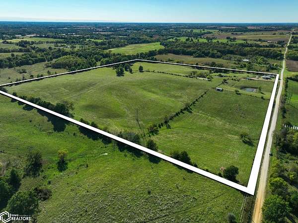 39 Acres of Agricultural Land with Home for Auction in Marceline, Missouri
