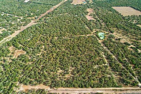 80 Acres of Land with Home for Sale in Seguin, Texas