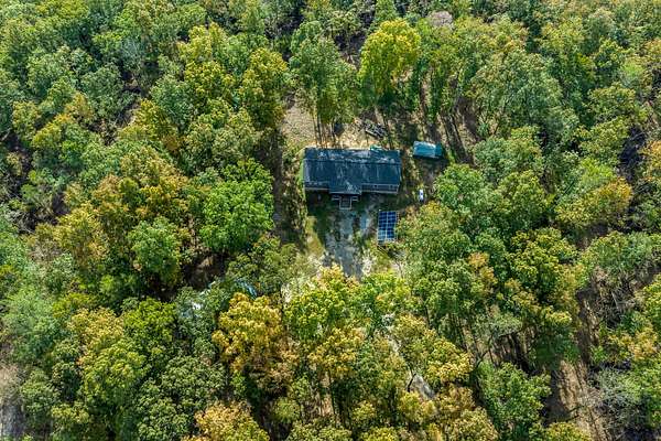 72.4 Acres of Recreational Land with Home for Sale in Charlotte, Tennessee