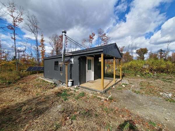 38.7 Acres of Recreational Land with Home for Sale in Amity Town, Maine