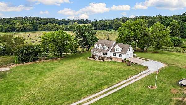 83 Acres of Agricultural Land with Home for Sale in Pea Ridge, Arkansas