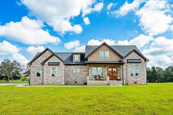 5 Acres of Residential Land with Home for Sale in Minor Hill, Tennessee