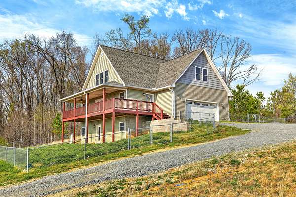 16.3 Acres of Recreational Land with Home for Sale in Oldfort, Tennessee