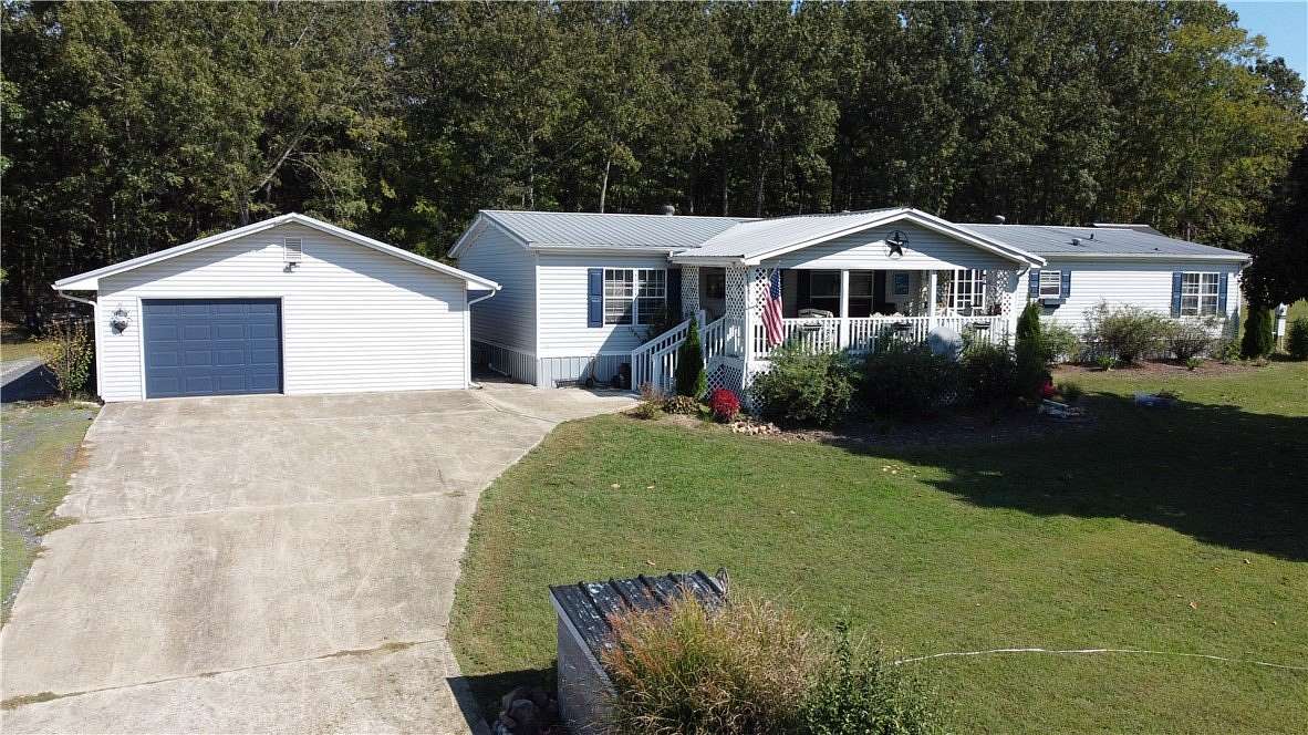 10.8 Acres of Land with Home for Sale in St. Joe, Arkansas