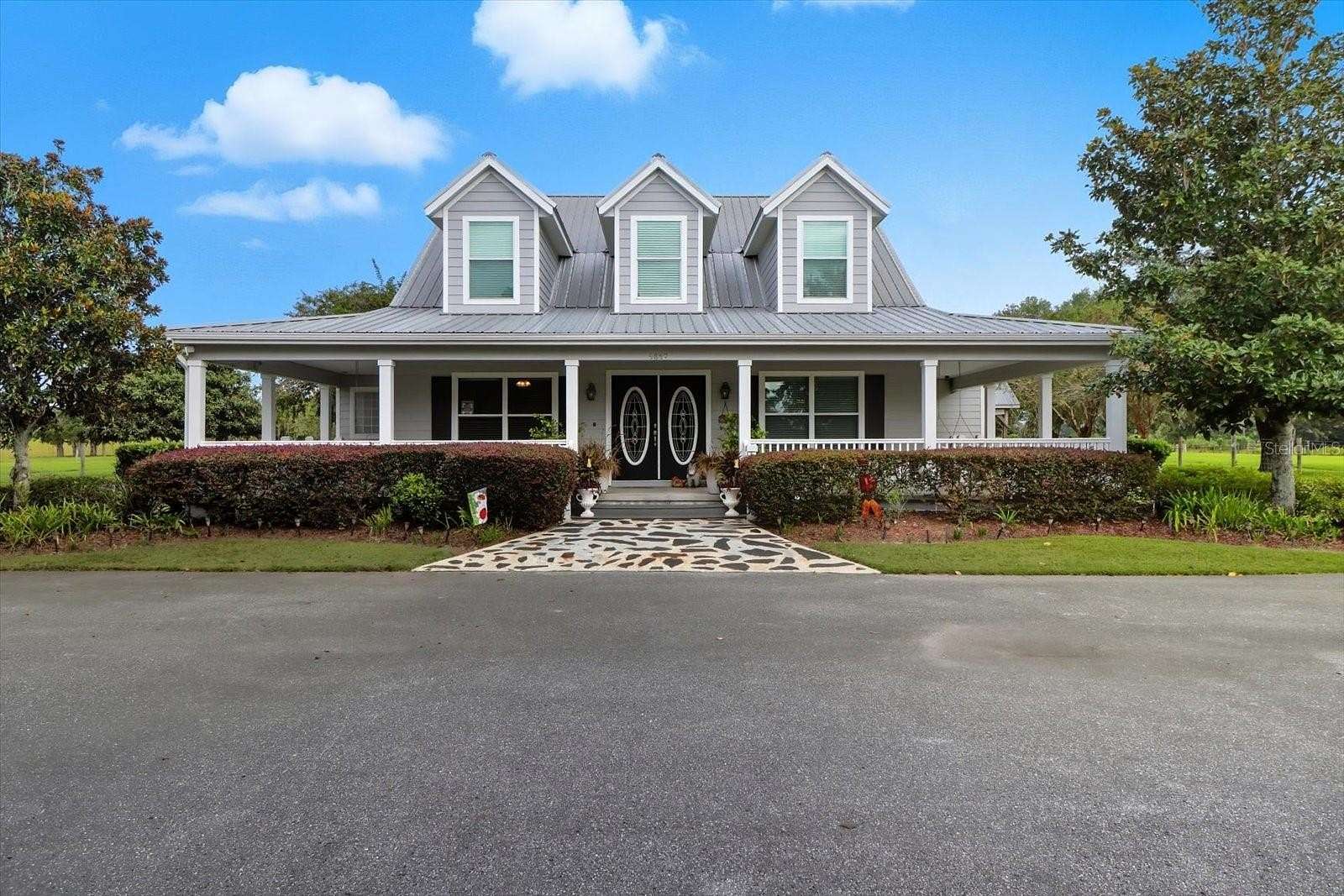 27.7 Acres of Land with Home for Sale in Morriston, Florida