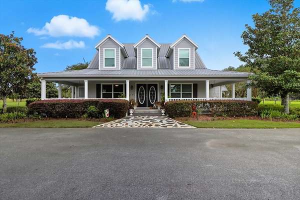 27.7 Acres of Land with Home for Sale in Morriston, Florida