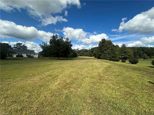 7.76 Acres of Residential Land with Home for Sale in Oak Ridge, North Carolina