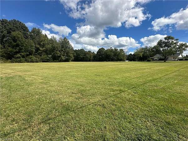 7.76 Acres of Land with Home for Sale in Oak Ridge, North Carolina