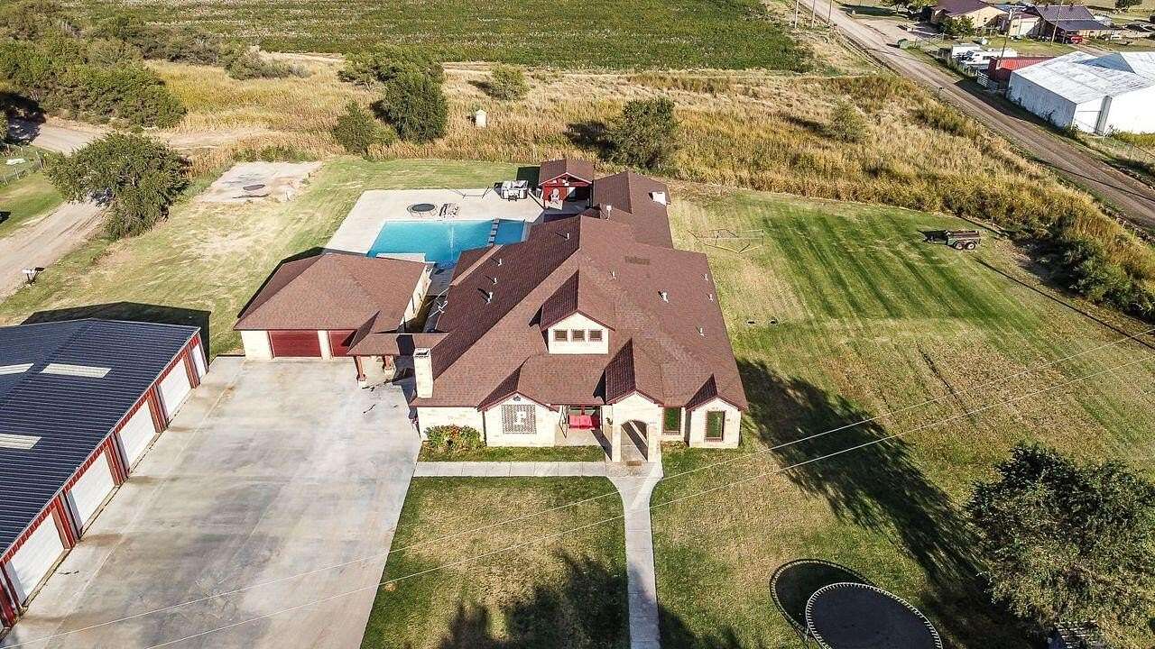 1.68 Acres of Residential Land with Home for Sale in Lubbock, Texas