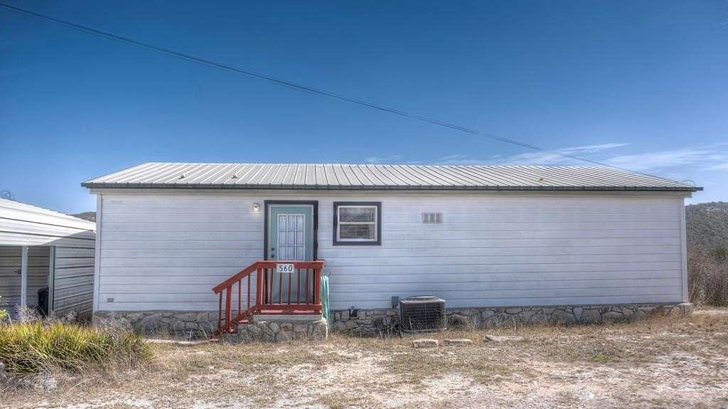 5.2 Acres of Residential Land with Home for Sale in Camp Wood, Texas