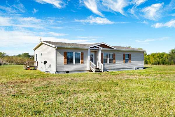 10.9 Acres of Land with Home for Sale in Chapman, Kansas