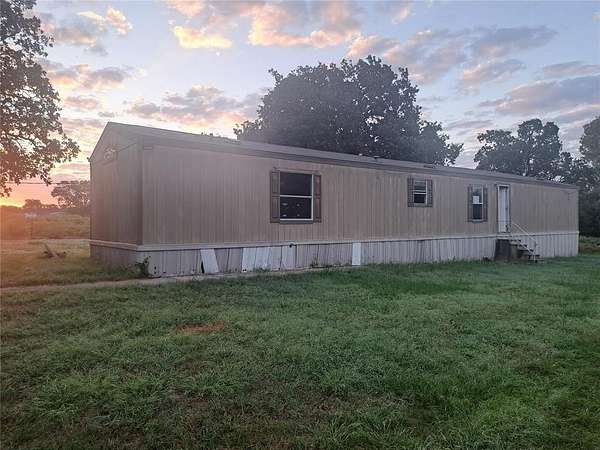 7.3 Acres of Residential Land with Home for Sale in Lone Grove, Oklahoma