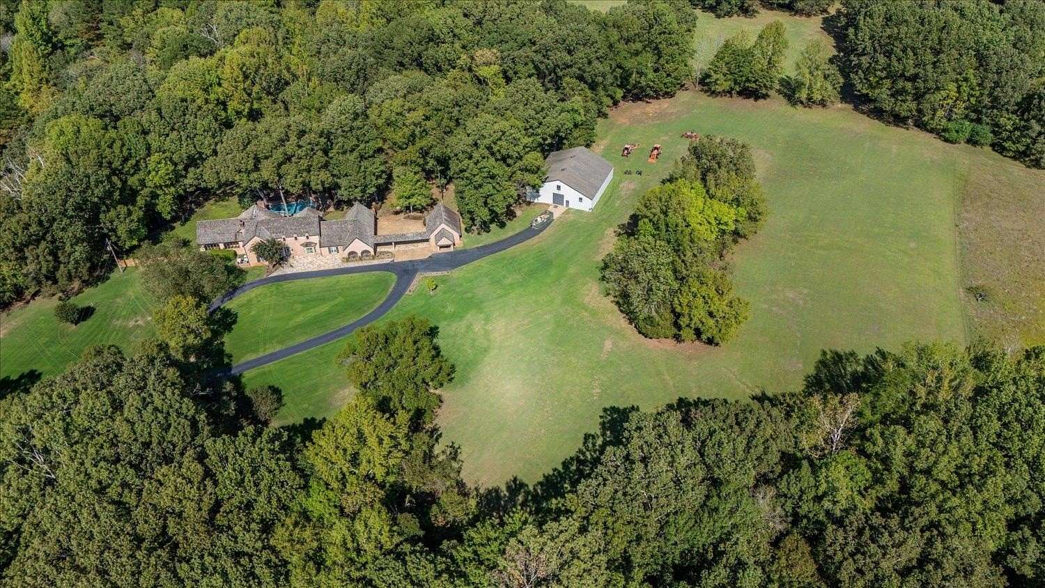 14.6 Acres of Land with Home for Sale in Eads, Tennessee