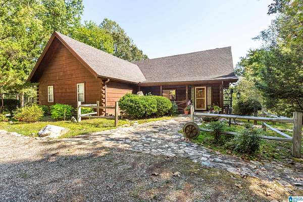 10.8 Acres of Land with Home for Sale in Delta, Alabama