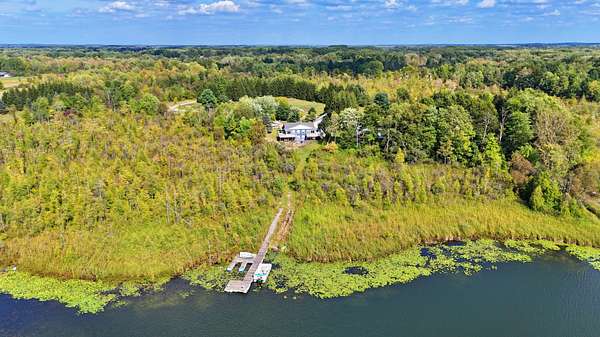 23.5 Acres of Recreational Land with Home for Sale in Pierson, Michigan