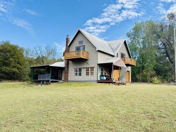 80 Acres of Land with Home for Sale in Stockton, Missouri