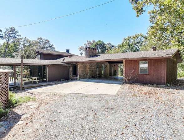 9.33 Acres of Residential Land with Home for Sale in Wickes, Arkansas