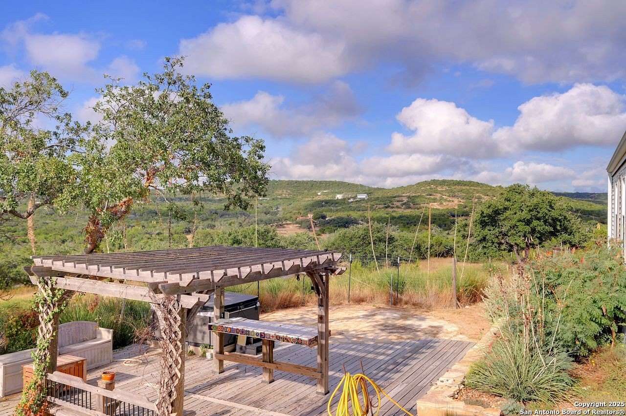 5.76 Acres of Residential Land with Home for Sale in Kendalia, Texas