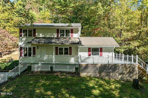 4.37 Acres of Residential Land with Home for Sale in Mountain City, Tennessee