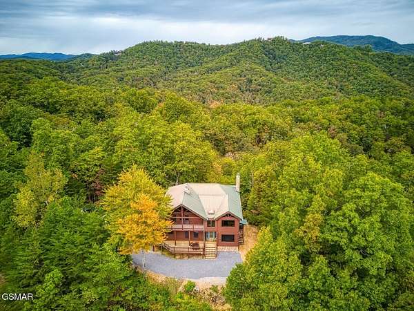 5.77 Acres of Residential Land with Home for Sale in Sevierville, Tennessee