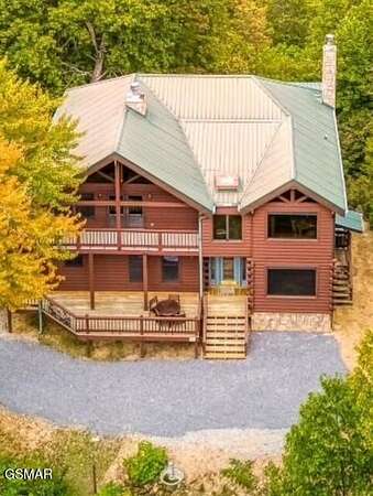 5.77 Acres of Land with Home for Sale in Sevierville, Tennessee