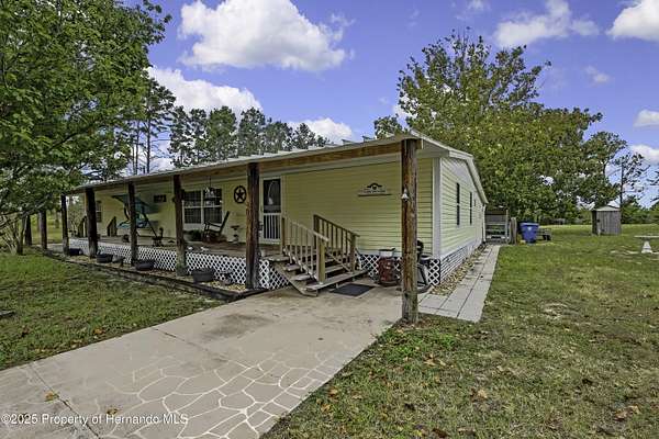 2.8 Acres of Residential Land with Home for Sale in Weeki Wachee, Florida