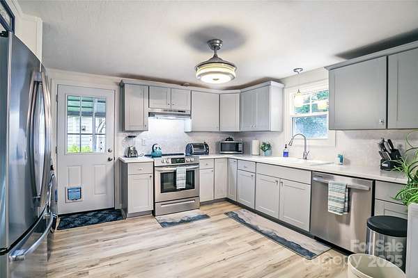 2 Acres of Residential Land with Home for Sale in Fletcher, North Carolina