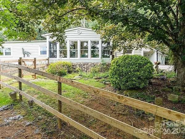 2 Acres of Residential Land with Home for Sale in Fletcher, North Carolina