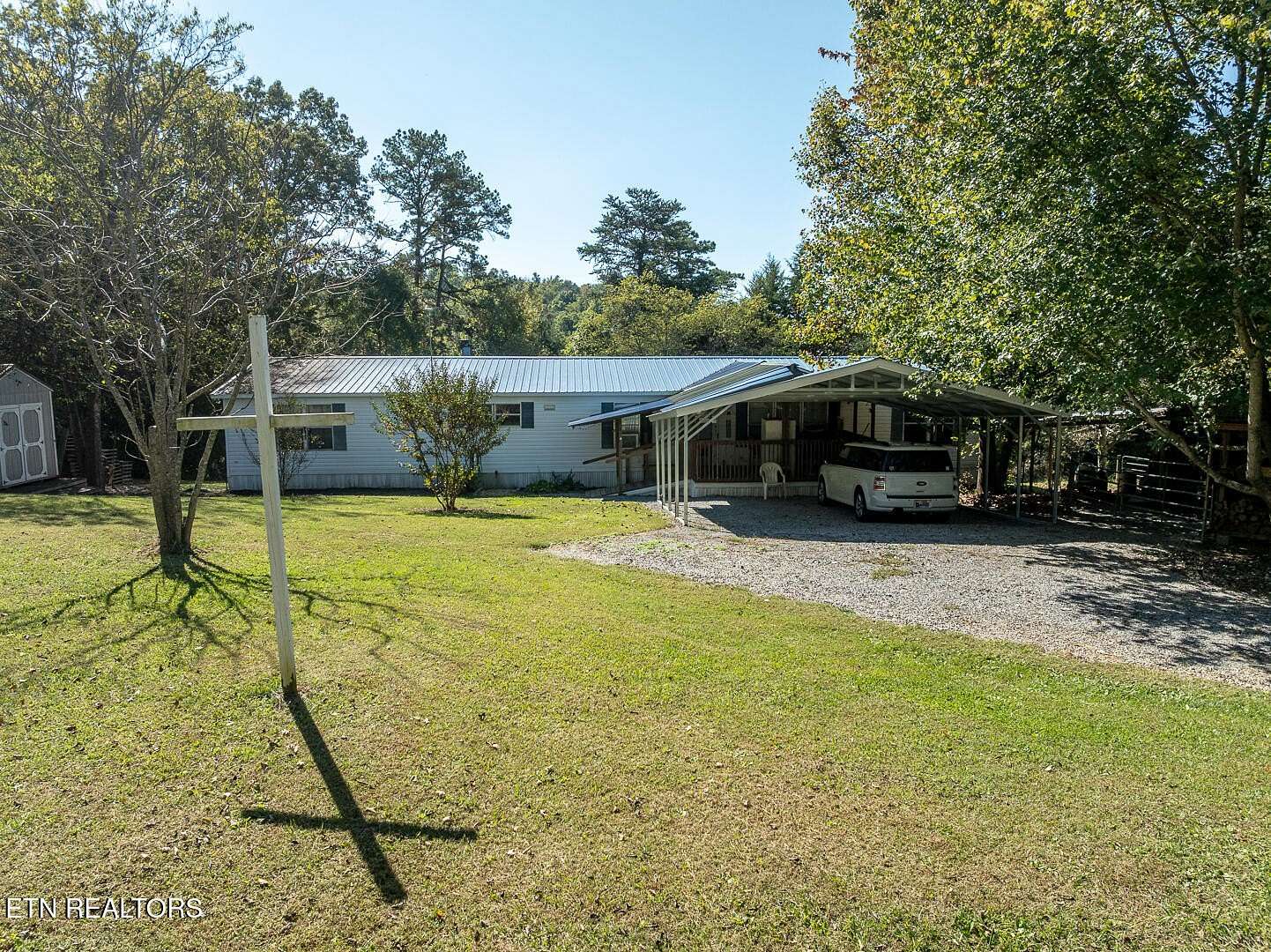 12.3 Acres of Land with Home for Sale in Strawberry Plains, Tennessee