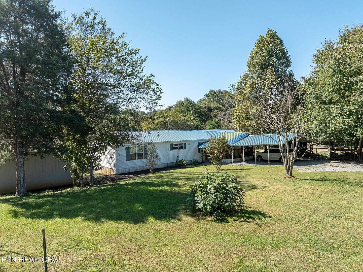 12.3 Acres of Land with Home for Sale in Strawberry Plains, Tennessee