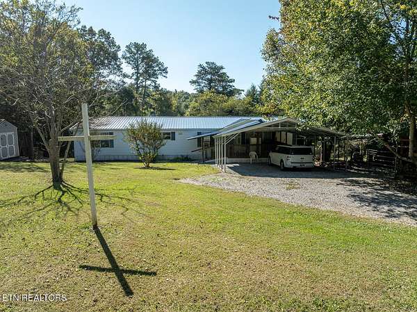 12.3 Acres of Land with Home for Sale in Strawberry Plains, Tennessee