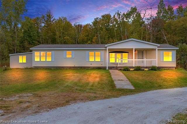 8.77 Acres of Residential Land with Home for Sale in Wales Township, Michigan