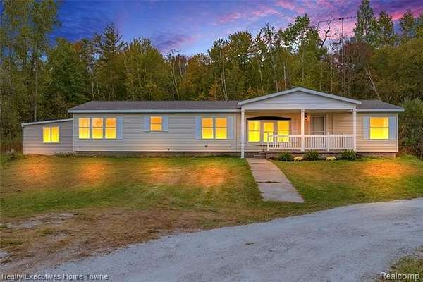 8.77 Acres of Residential Land with Home for Sale in Wales Township, Michigan