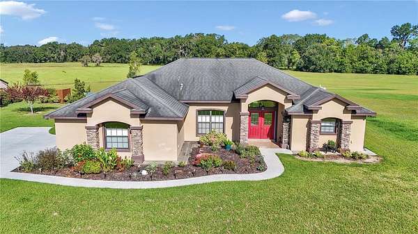 5.62 Acres of Residential Land with Home for Sale in Citra, Florida