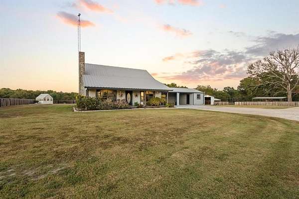 7 Acres of Land with Home for Sale in Deport, Texas