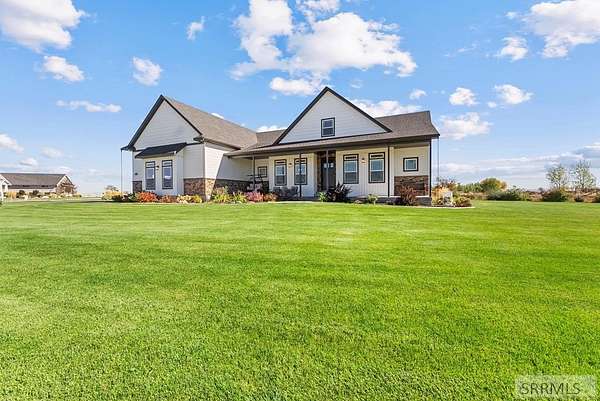 5 Acres of Residential Land with Home for Sale in Rigby, Idaho