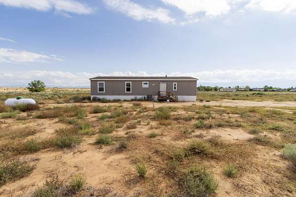 5.14 Acres of Residential Land with Home for Sale in Los Lunas, New Mexico