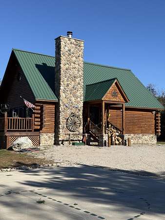 40 Acres of Recreational Land with Home for Sale in Vanderbilt, Michigan