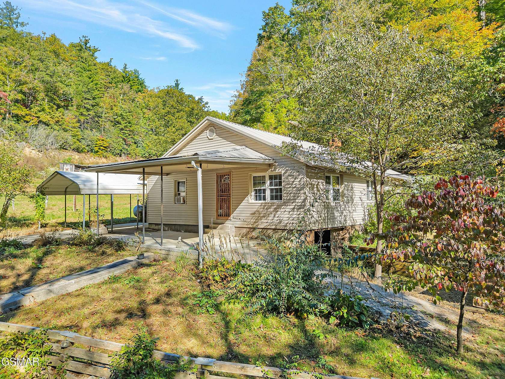 9.79 Acres of Land with Home for Sale in Hartford, Tennessee