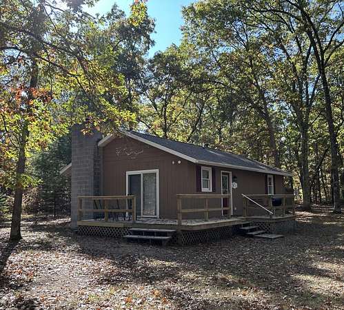 5 Acres of Residential Land with Home for Sale in Baldwin, Michigan