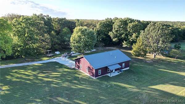 85 Acres of Recreational Land with Home for Sale in Versailles, Missouri