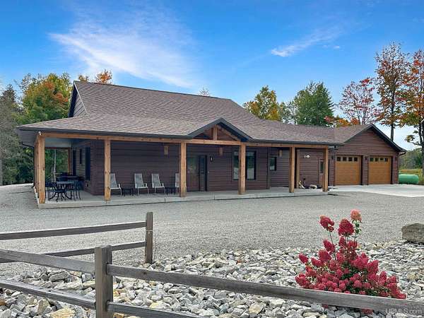 35.2 Acres of Land with Home for Sale in Carney, Michigan