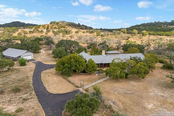 31.8 Acres of Agricultural Land with Home for Sale in Comfort, Texas