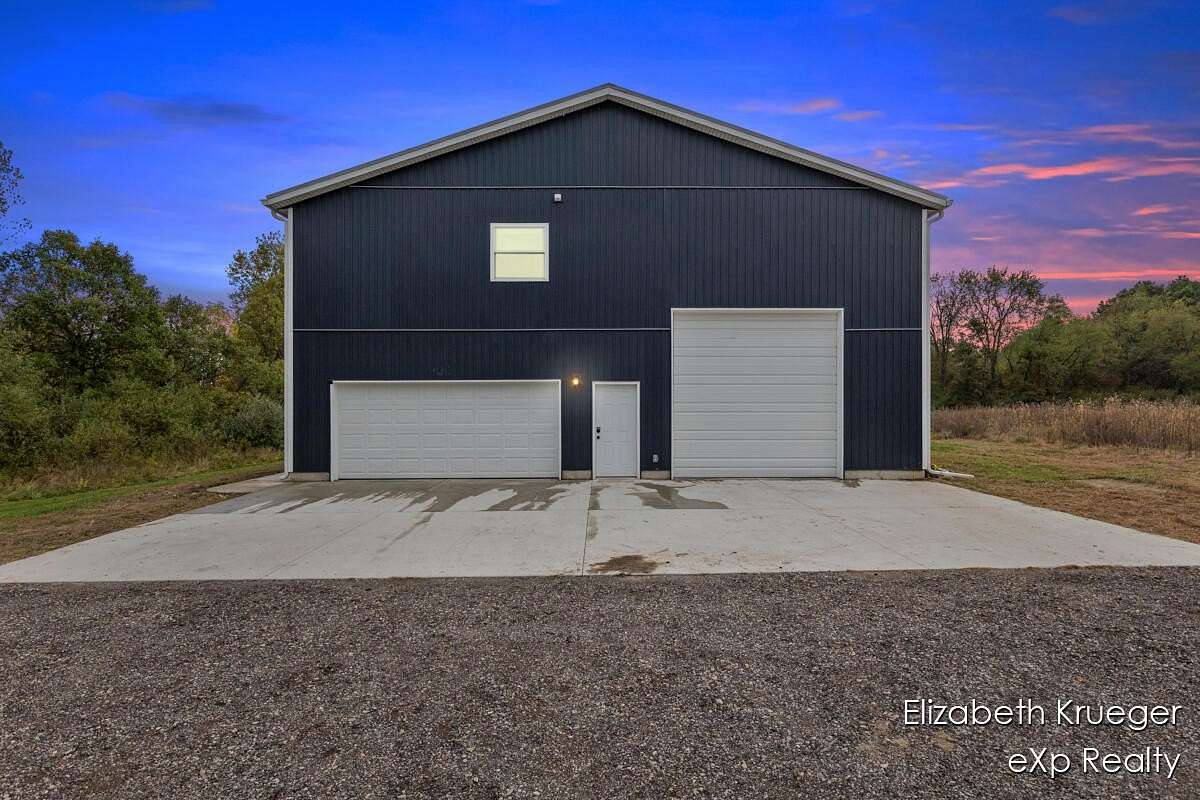 2 Acres of Land with Home for Sale in Alto, Michigan