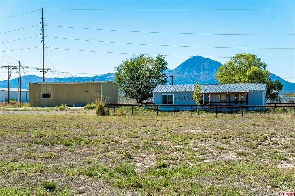 3 Acres of Residential Land with Home for Sale in Cortez, Colorado