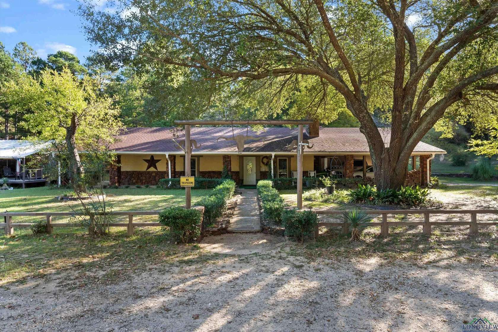 3.88 Acres of Residential Land with Home for Sale in Tatum, Texas