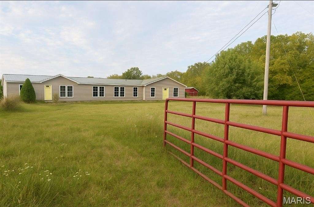 72.7 Acres of Land with Home for Sale in Laquey, Missouri