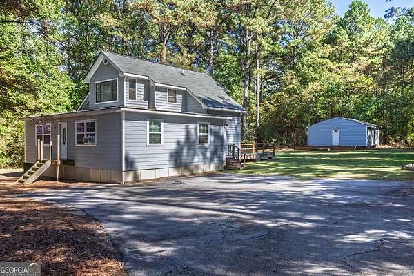 1.79 Acres of Residential Land with Home for Sale in Loganville, Georgia