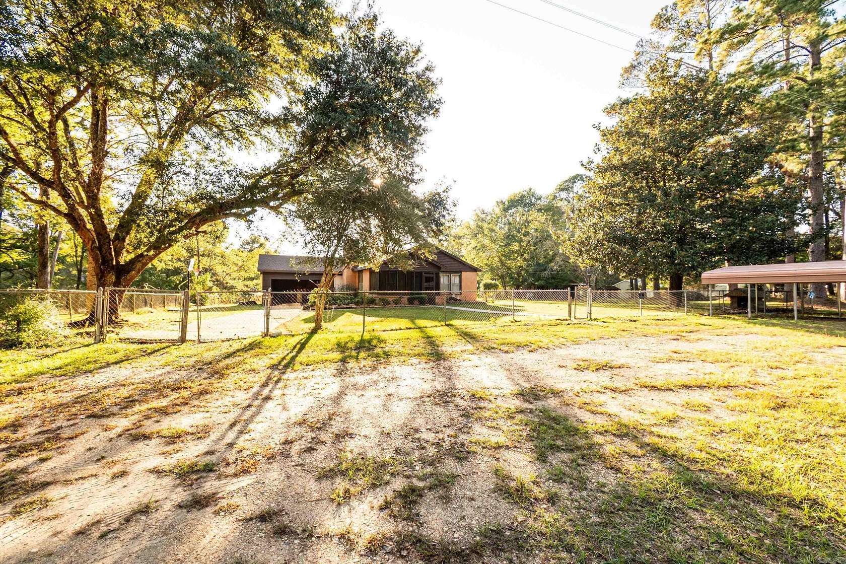 7.8 Acres of Land with Home for Sale in El Dorado, Arkansas