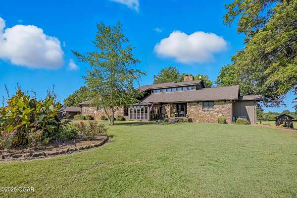 75 Acres of Land with Home for Sale in Carl Junction, Missouri